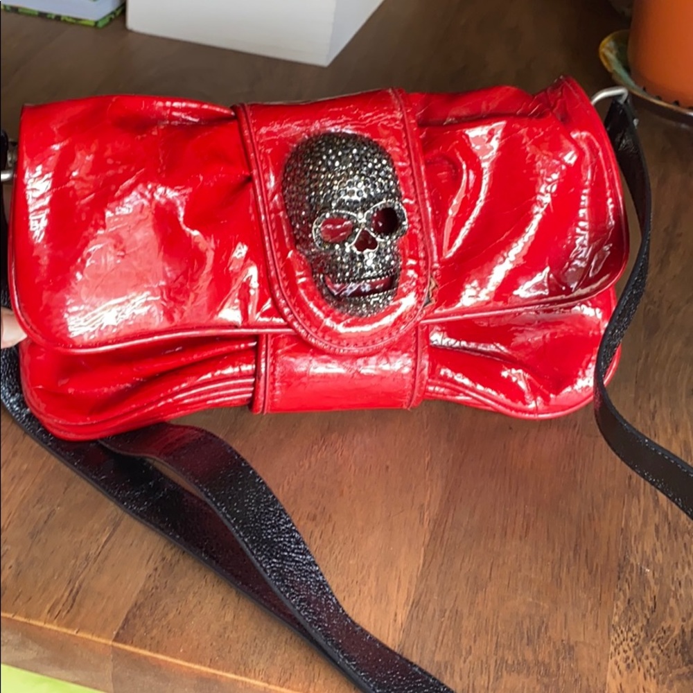 Red purse with rhinestone skull